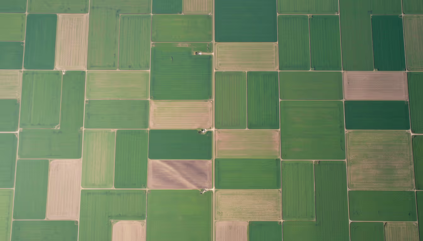 Aerial view of agricultural land divided into rectangular grid sections illustrating the Public Land Survey System